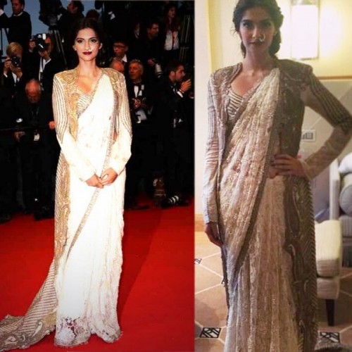 Sonam Kapoor pairs her Annamika Khanna sari with an embroidered jacket. She pulls the the whole outfit together with her mother's nathni. 